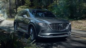 Front angle view of Machine Gray Metallic 2023 Mazda CX-9 midsize SUV