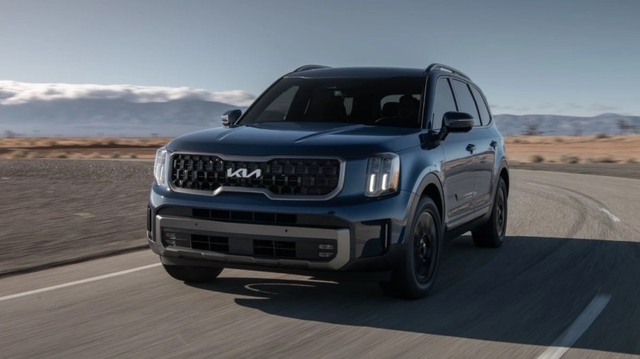 Front angle view of Midnight Lake Blue 2023 Kia Telluride midsize SUV