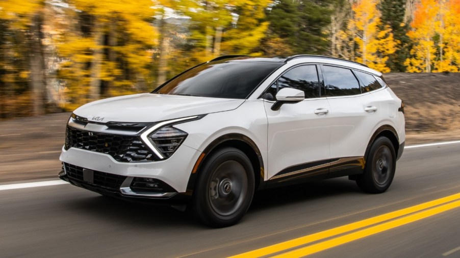 Front angle view of white 2023 Kia Sportage crossover SUV