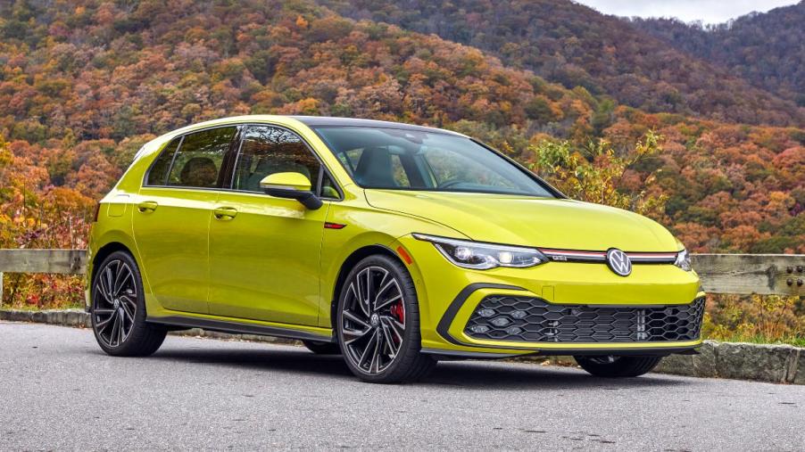 Front angle view of yellow 2022 Volkswagen Golf GTI