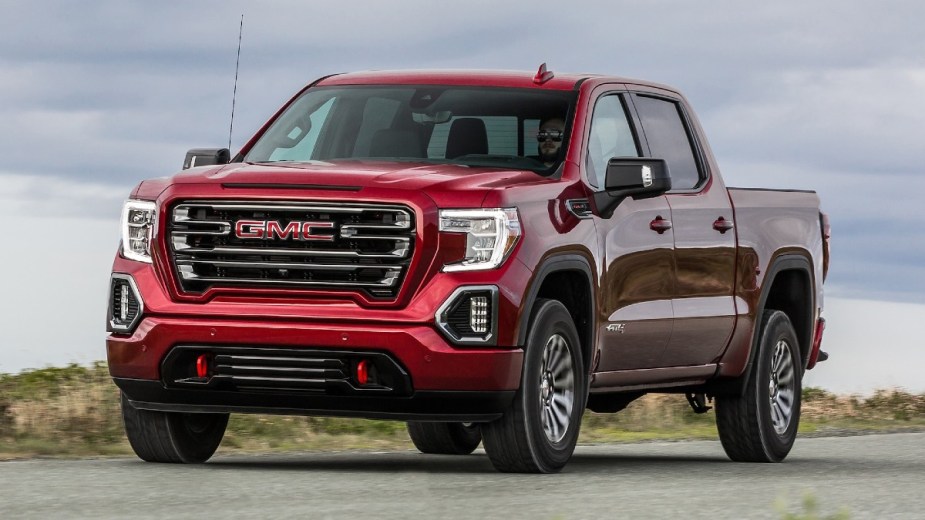 Red GMC Sierra 1500 Duramax Diesel is one of the last half-ton diesel pickup trucks in the market.