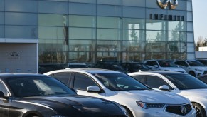 Can I ask a dealer to remove its branding stickers from my car?