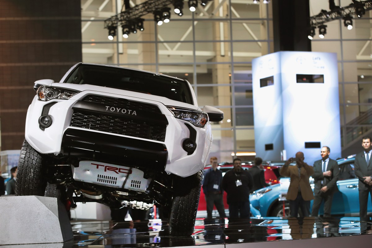 a white Toyota 4Runner at an auto show 