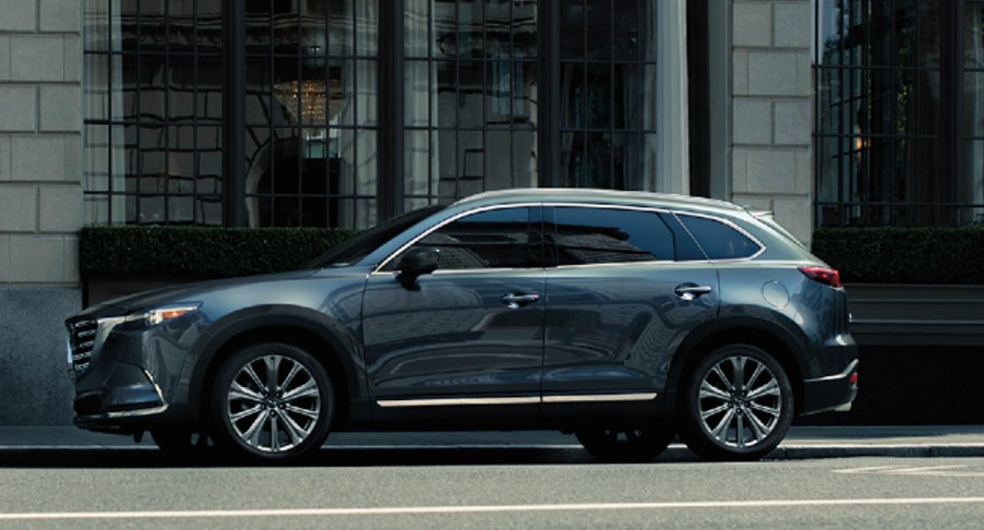 A gray 2023 Mazda CX-9 midsize SUV is parked.