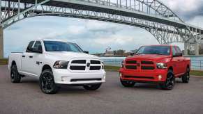 Two Ram Classics parked by a bridge