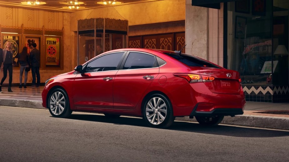 Rear angle view of red 2022 Hyundai Accent