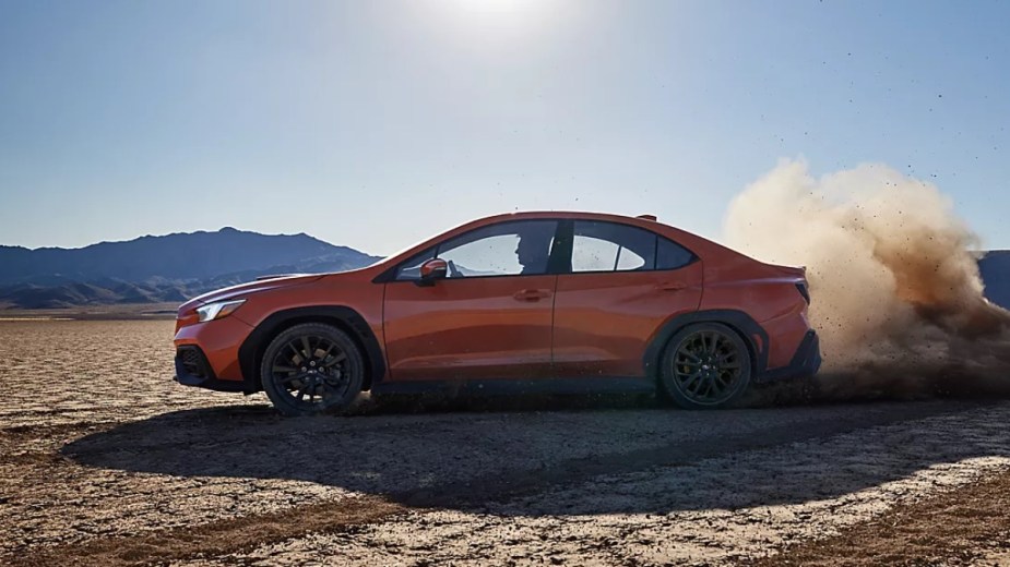 Side view of orange 2022 Subaru WRX