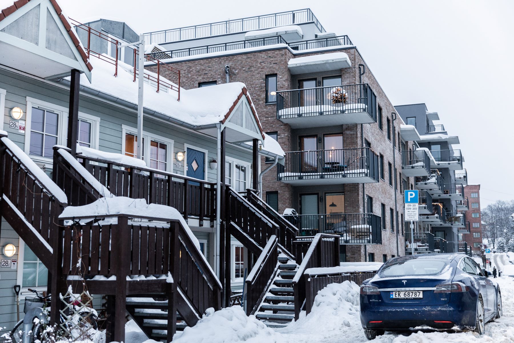 A Tesla Model S electric vehicle (EV) parked in cold weather and winter snow in Oslo, Norway