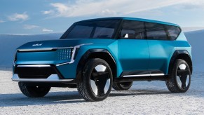 A blue 2024 Kia EV9 concept SUV.