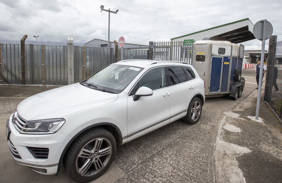 An SUV towing a box trailer, which could be what you can tow with a 4,000 pound towing capacity limit. 