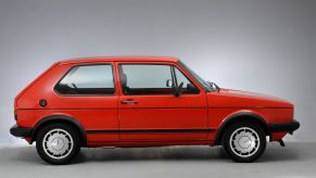 A red 1983 Volkswagen Golf GTI Mk1 model