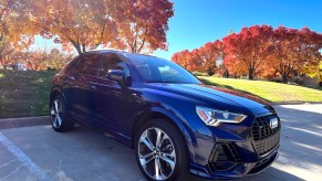 2022 Audi Q3 next to trees