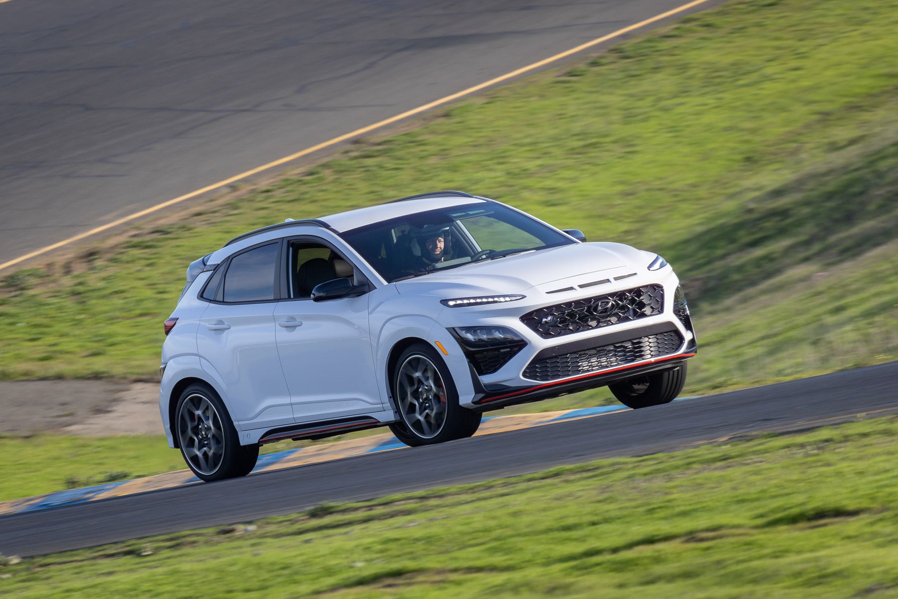 A white 2022 Hyundai Kona N performance-focused compact SUV model