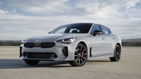 A slate gray 2022 Kia Stinger Scorpion Special Edition four-door sports sedan model