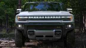 A gray GMC Hummer EV is parked.