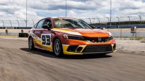 A Honda Civic Si Race Car on a track.