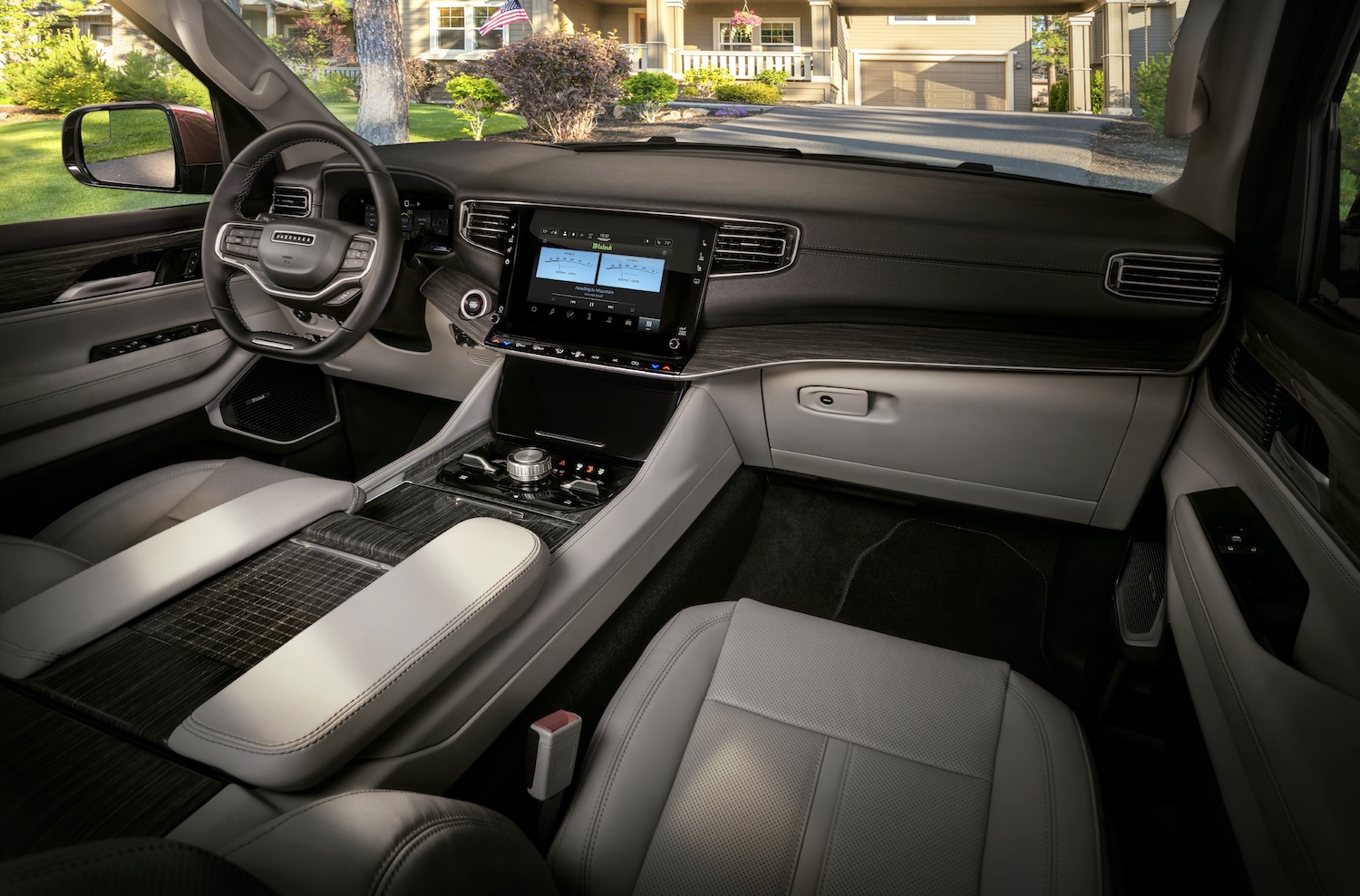 The interior of a Series I Grand Wagoneer luxury SUV base model with leather-trimmed seats.