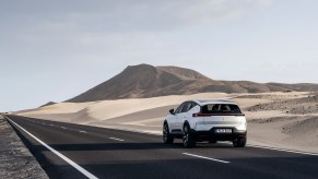 2023 Polestar 3 from the rear in white near desert sands