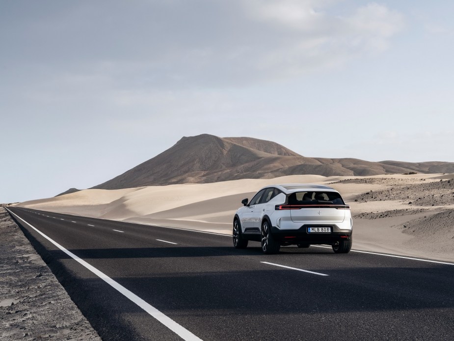 2023 Polestar 3 from the rear in white near desert sands