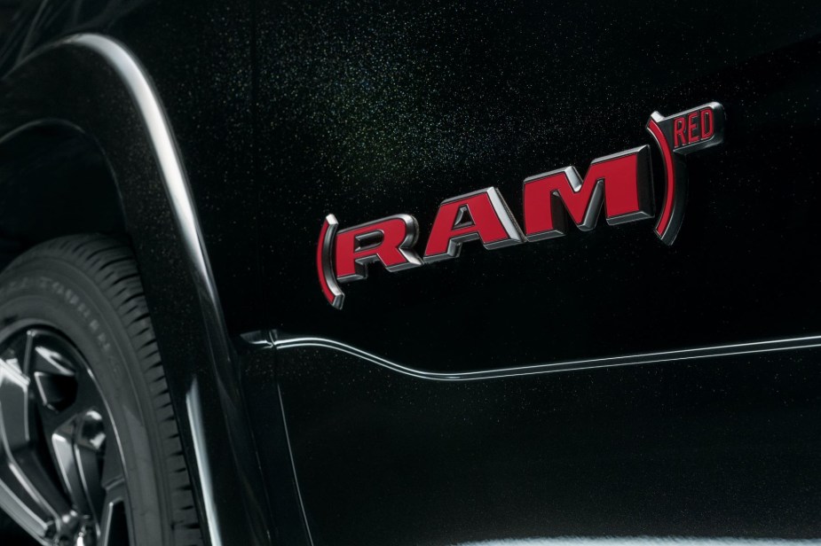 (RAM)RED special edition badging on a black 2023 Ram 1500 full-size pickup truck