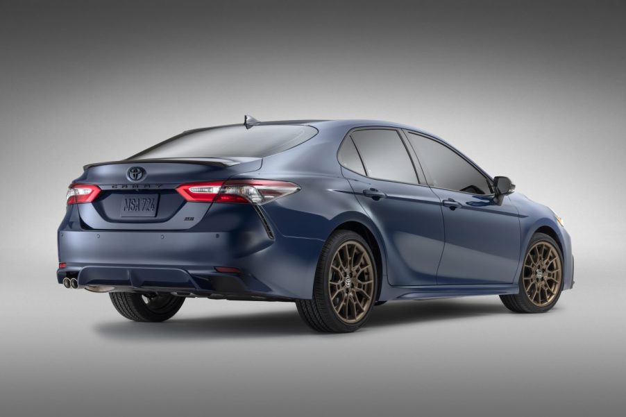 A rear view of one of the 2023 Toyota Camry sedans, which has three engine options