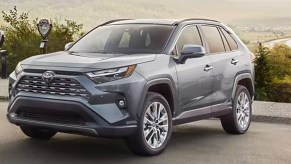 A gray 2023 Toyota RAV4 is parked.