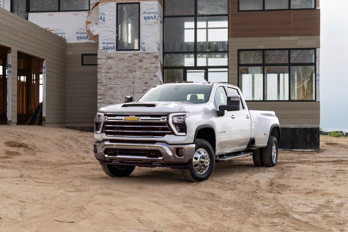 Front 3/4 view of 2024 Chevrolet Silverado 3500HD LTZ Dually at construction site