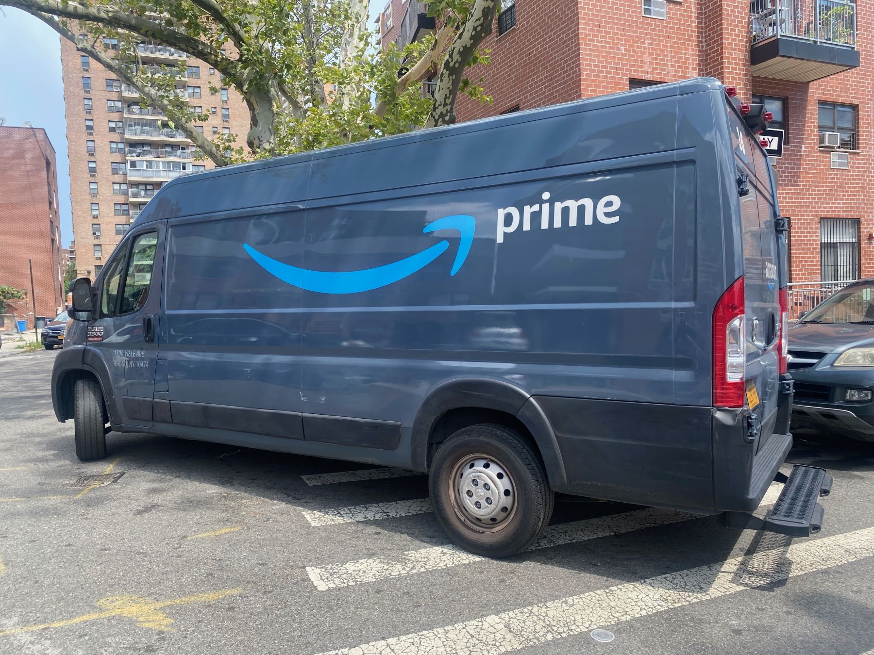 An Amazon Prime commercial vehicle business delivery van in Queens, New York