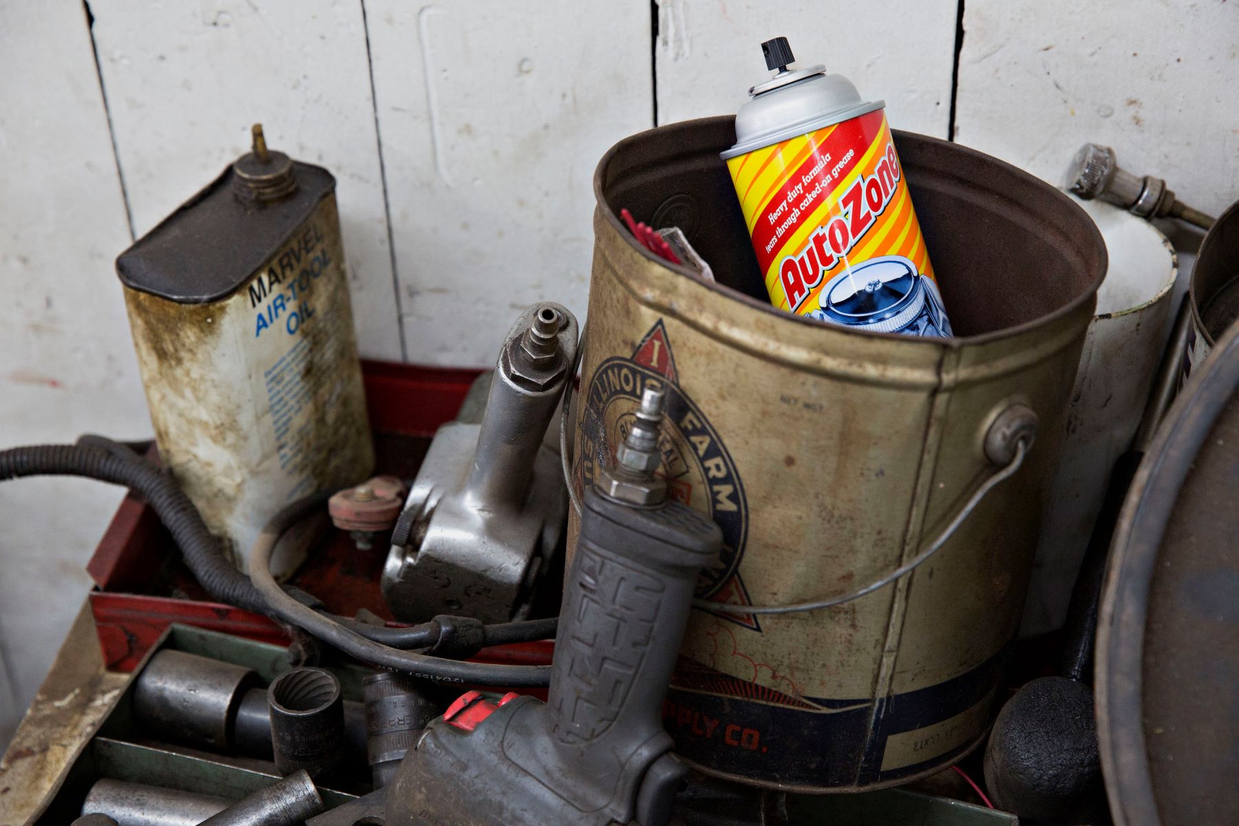 AutoZone engine degreaser in a rusted can in a garage in Tiskilwa, Illinois