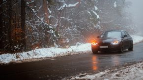 A BMW driving in the snow