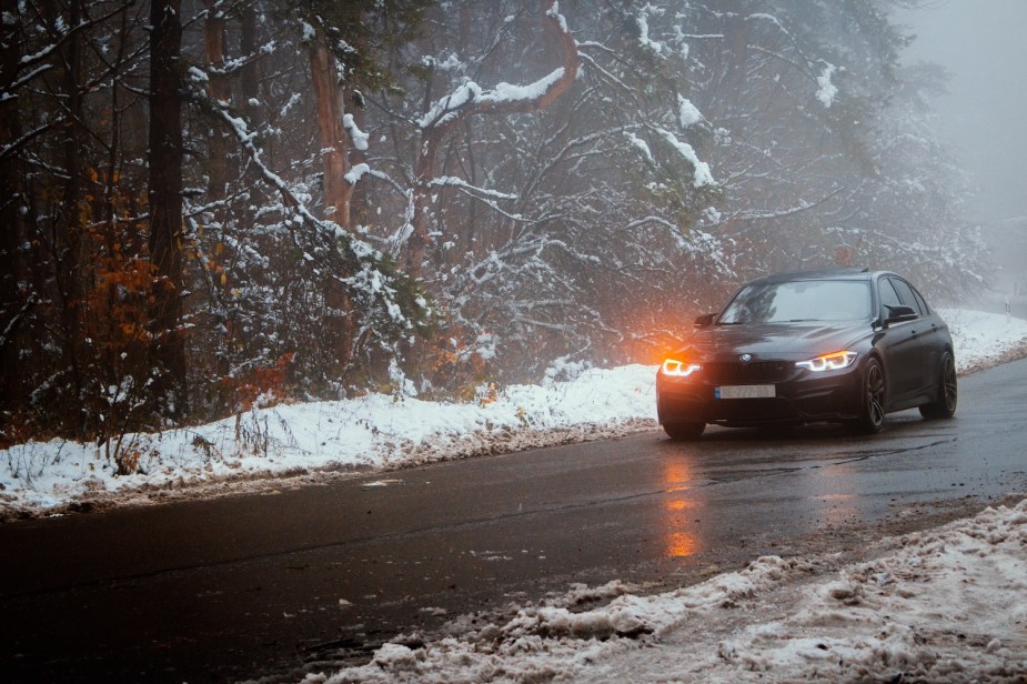 A BMW driving in the snow