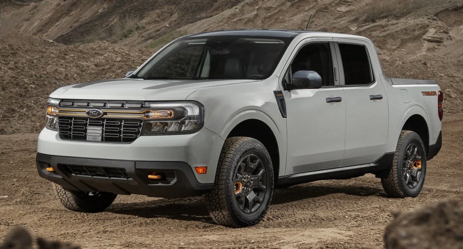 A gray Ford Maverick Tremor is parked. 