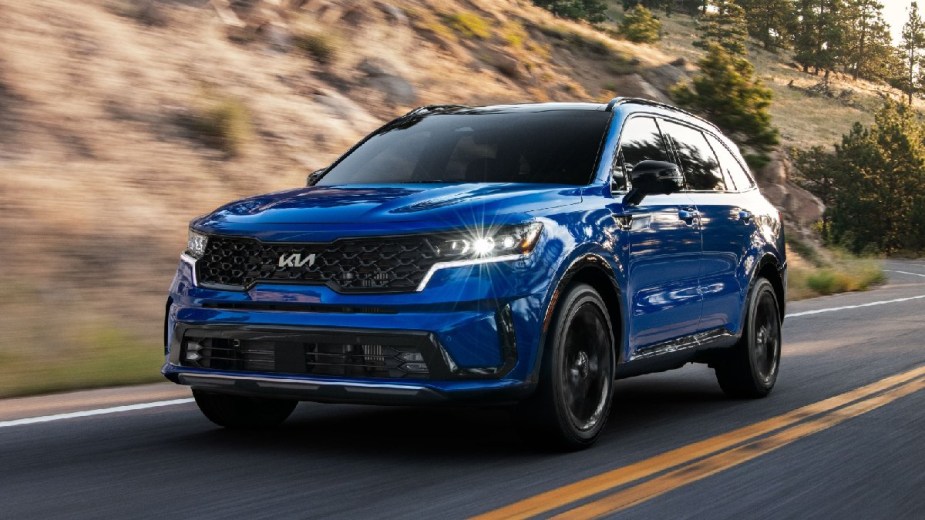 Front angle view of Sapphire Blue 2023 Kia Sorento midsize SUV.