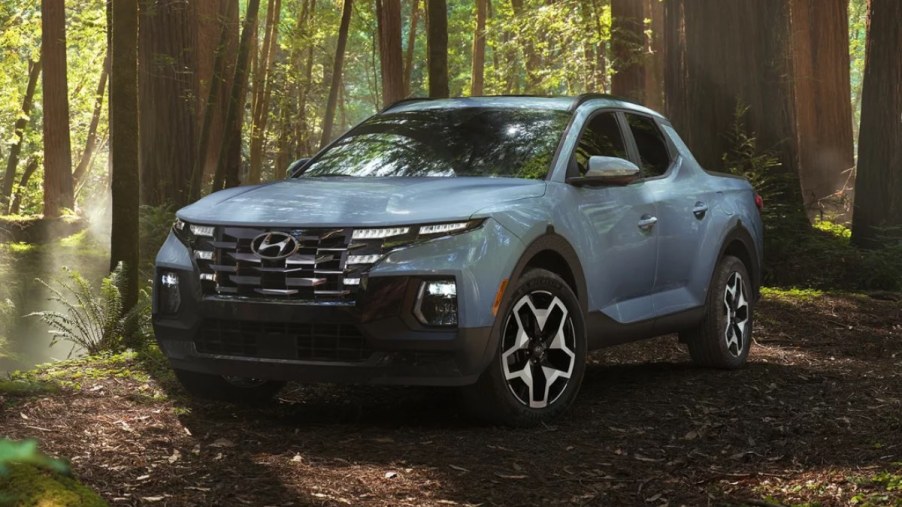 Front angle view of blue 2023 Hyundai Santa Cruz, highlighting affordable pickup truck alternatives costing under $28,000