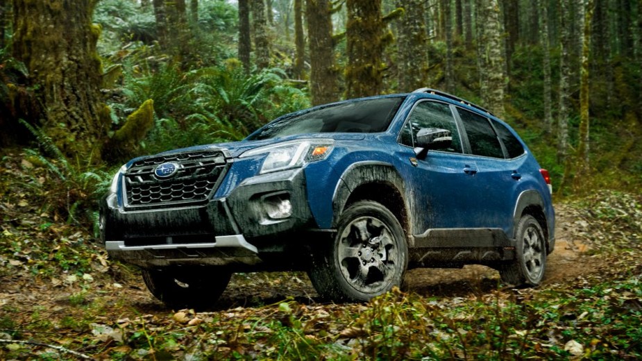 Front angle view of blue 2023 Subaru Forester crossover SUV