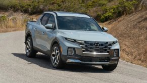 Front angle view of Blue Stone 2023 Hyundai Santa Cruz pickup truck