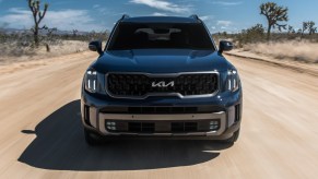 Front view of blue 2023 Kia Telluride, highlighting midsize SUV alternatives that cost under $37,000