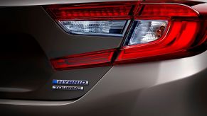 The rear badging on the trunk of a Honda Accord Hybrid Touring midsize sedan model