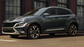 A gray 2023 Hyundai Kona subcompact SUV is parked.