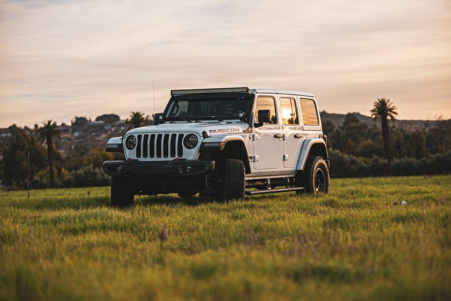 A white Jeep Wrangler SUV parked outdoors