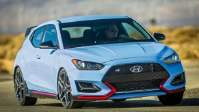 A blue 2022 Hyundai Veloster N is one of the most fuel efficient hot hatchbacks you can get.