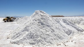 An All-Electric lithium mine with a pile of lithium.