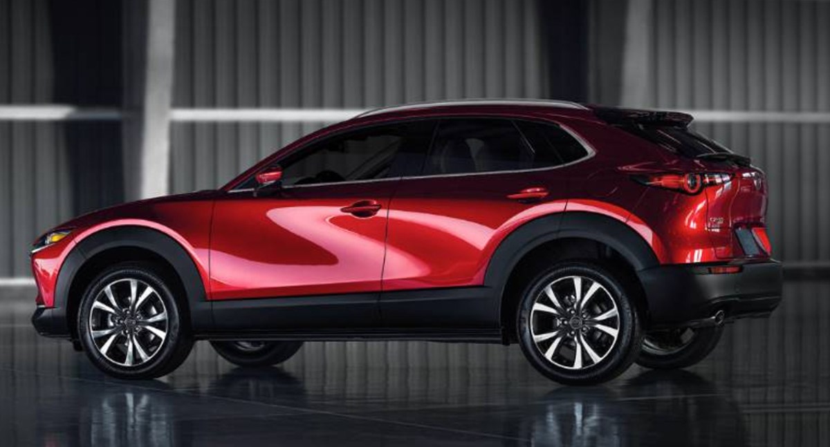 A red 2023 Mazda CX-30 subcompact SUV is parked.