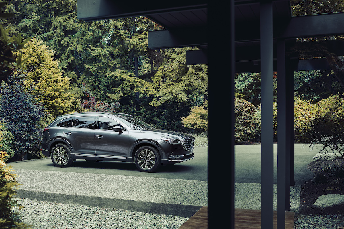 A silver 2023 Mazda CX-9 in an outdoor environment.