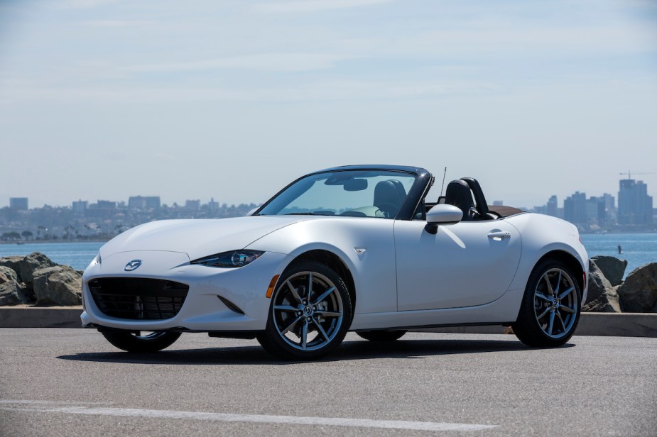 A white Mazda MX-5 Miata, among the most fuel efficient cars. 