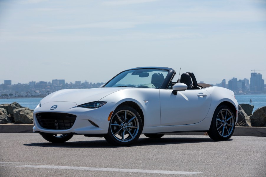 A white Mazda MX-5 Miata, among the most fuel efficient cars.