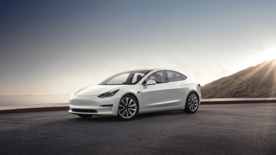 A white Tesla Model 3 in a press photo