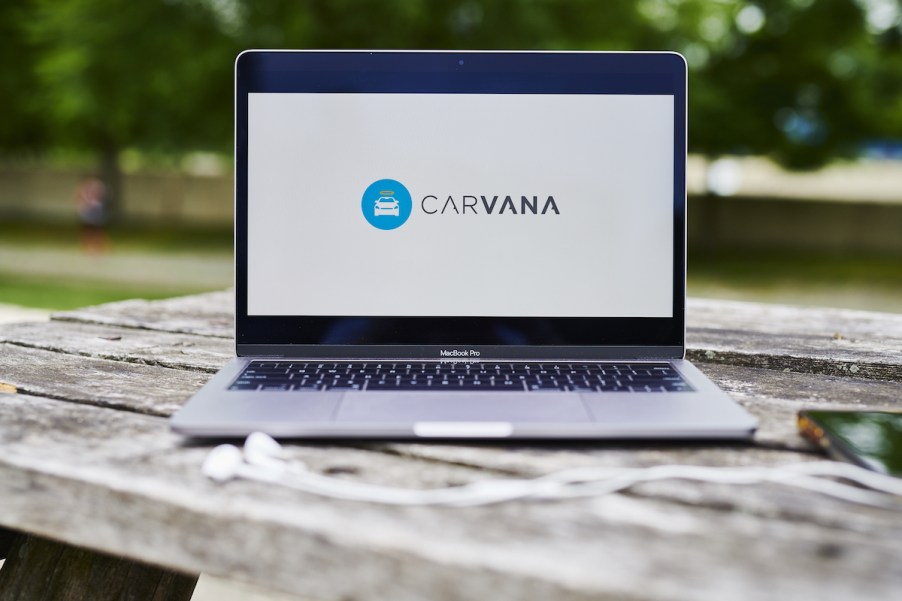 Carvana logo on a laptop where you can purchase a car online.