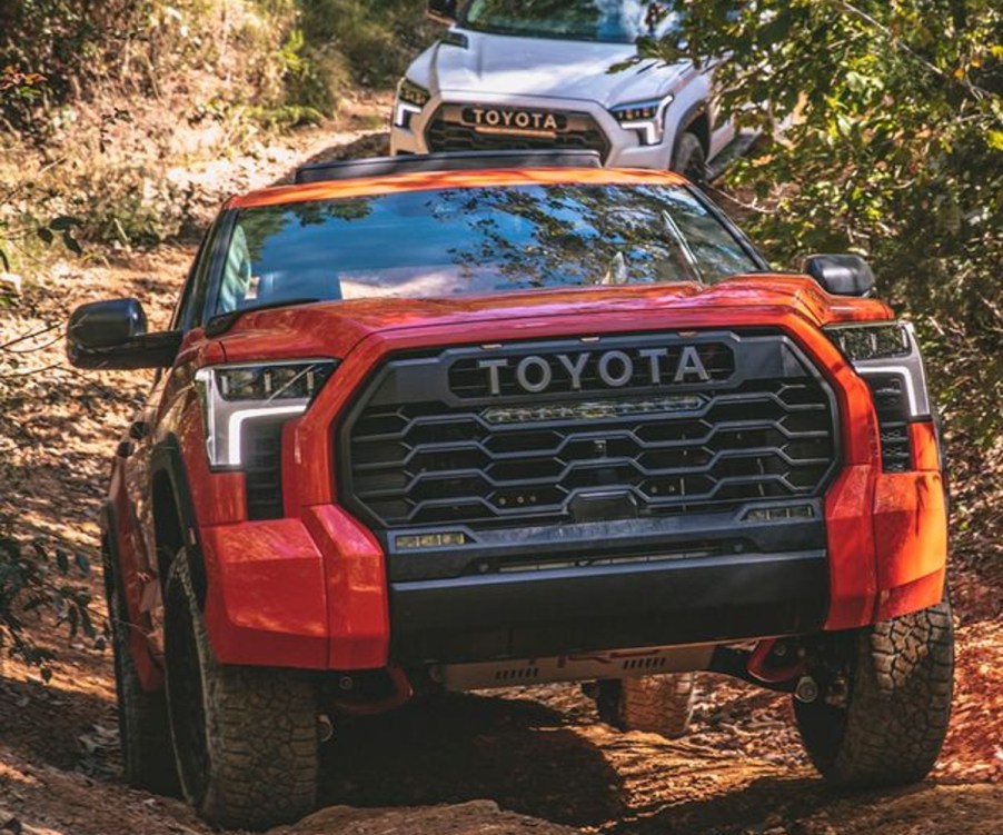 Orange Toyota Tundra TRD Pro on a Trail