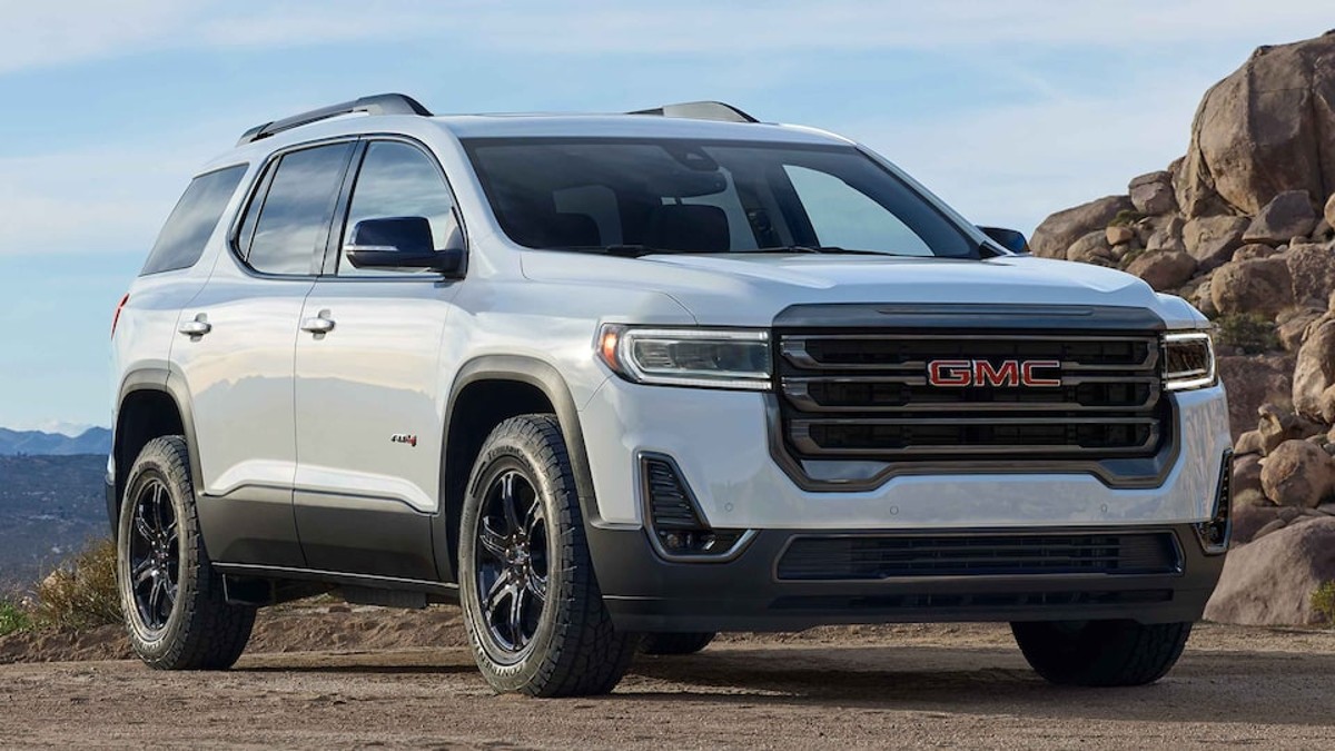 White 2023 GMC Acadia Posed on trails